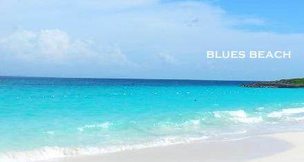 A wave of emerald bluish green