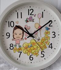 可愛い我が子の似顔絵入り時計