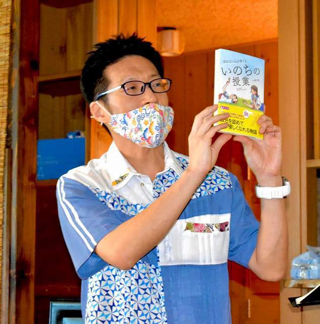 挨拶する主催者の長野宏昭医師